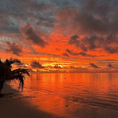 An incredible sunset taken in Aitutaki, Cook Islands, while vacationing there with my husband, Bruce.