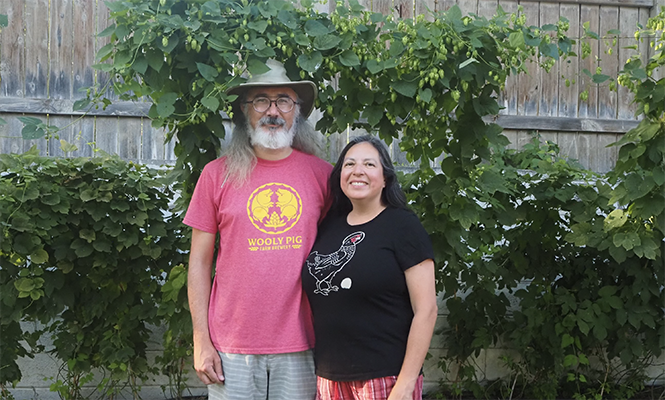 John Howa and Sonia Hernandez grow and harvest their own hops. - COURTESY PHOTO